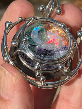 Caged galaxy rainbow pendant