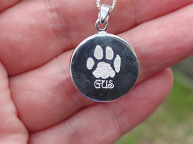 circle pendant with pawprint