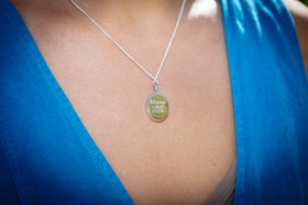 oval pendant with cremation ash