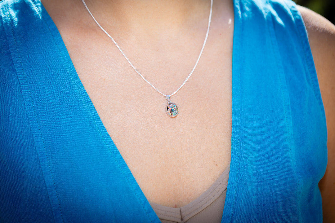 petite oval pendant with cremation ash