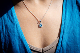 bedazzled oval pendant