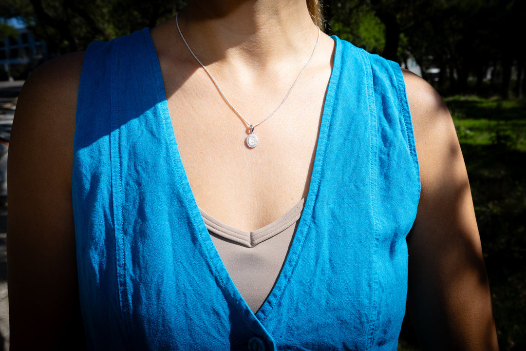 bedazzled oval pendant