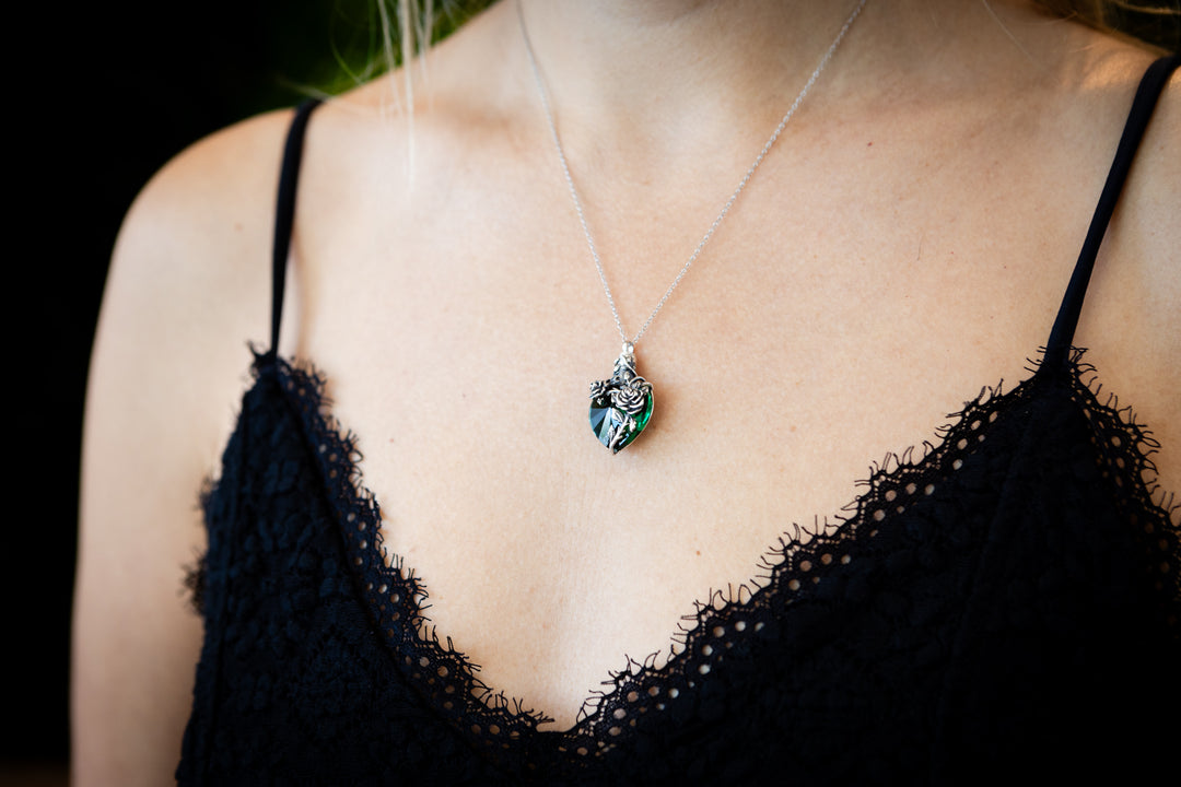 emerald green cremation jewelry with silver flower