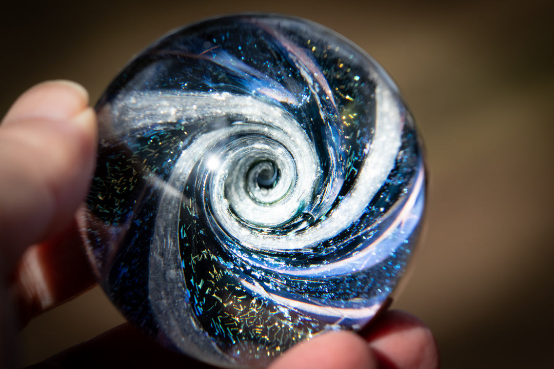 dichroic vortex marble with cremation ash