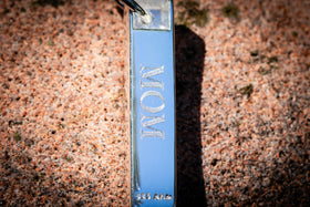 cremation bar pendant for ashes from pets and people, in purple, lime green and white engraved with MOM