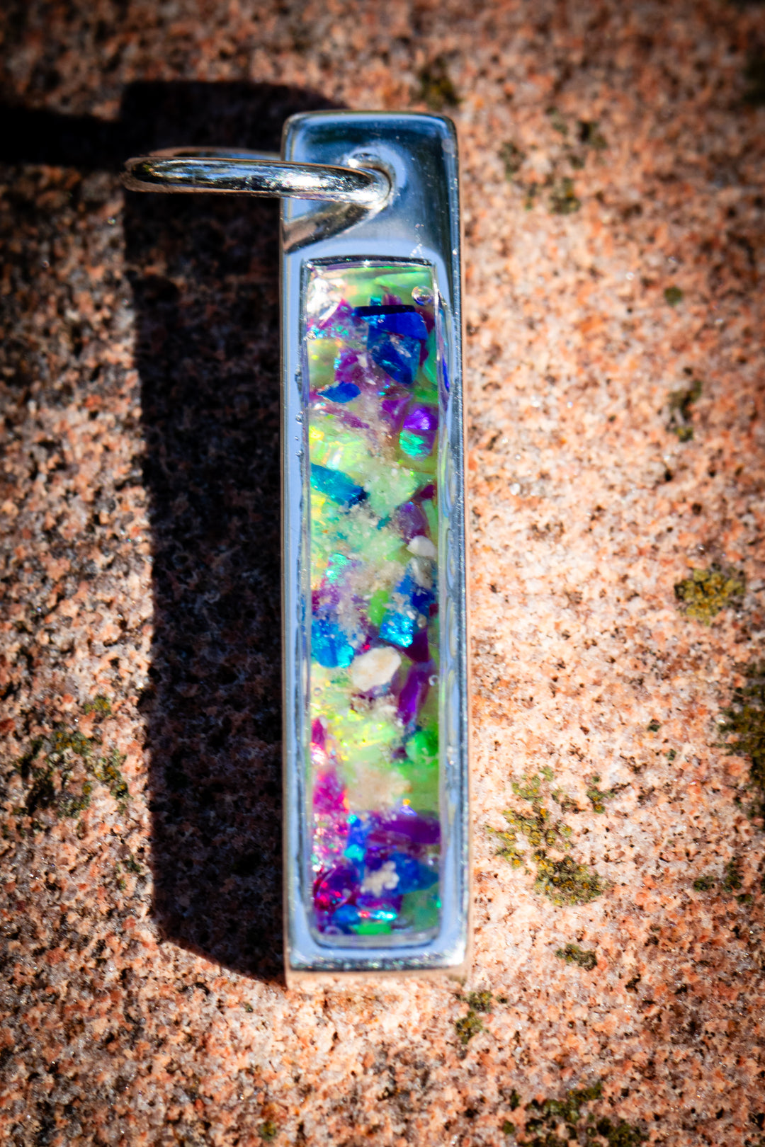 cremation bar pendant for ashes from pets and people, in purple, lime green and blue