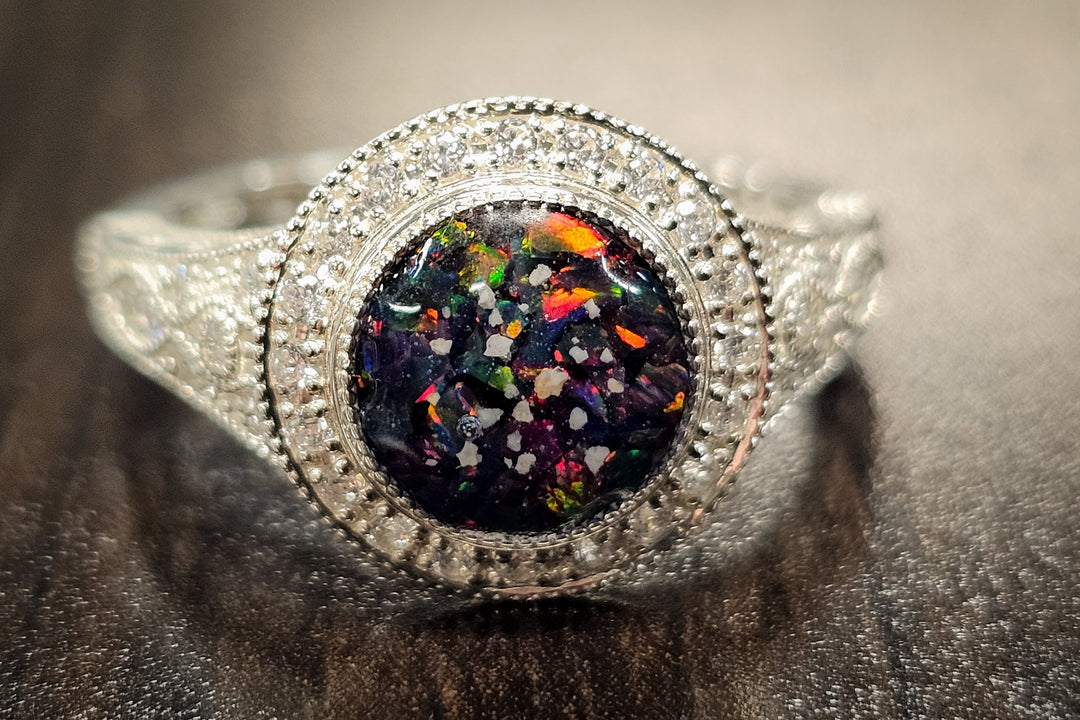 bedazzled filigree silver ring with ash