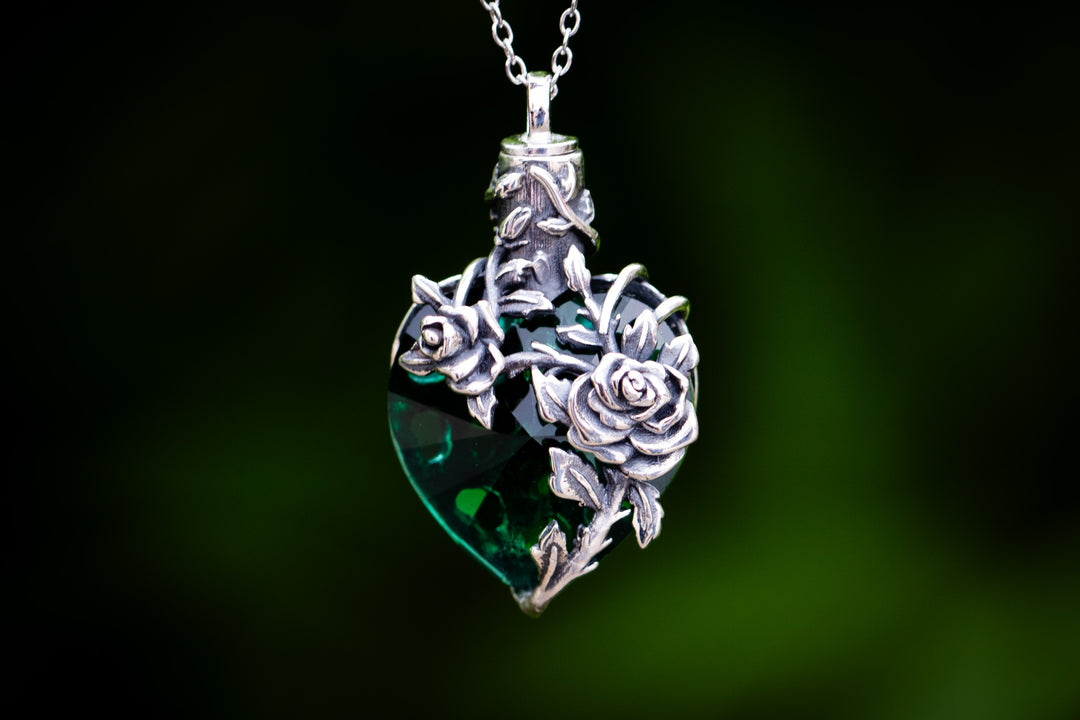 emerald green cremation jewelry with silver flower