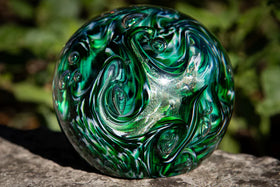 Glass orbs with cremation ash
