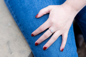 woman wearing sterling silver filigree leaf ring with cremation ash