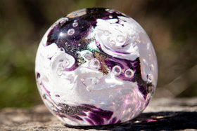 Glass orbs with cremation ash