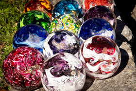 Glass orbs with cremation ash