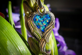 angel wing pendant with cremation ash in blues