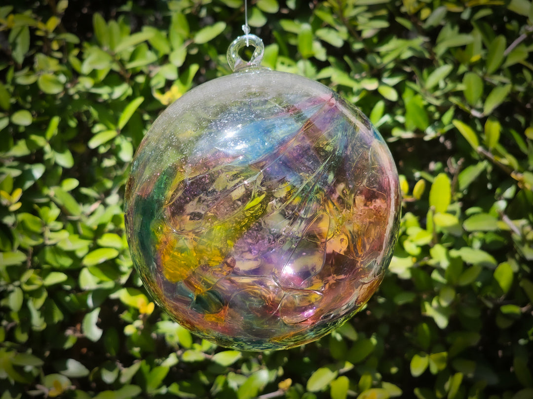 glass Christmas ornament with ash orange