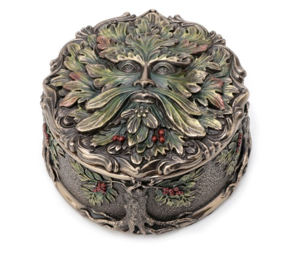 Green Man keepsake urn with a leafy face lid and a textured bronze base.