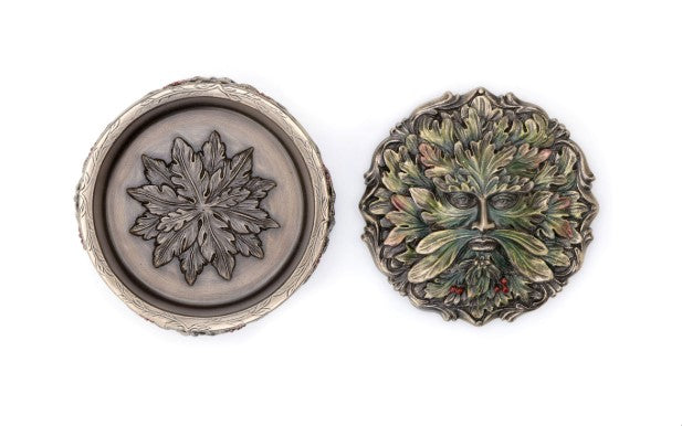 Bronze toned Green Man keepsake urn with a leaf carved round lid and a leafy face medallion