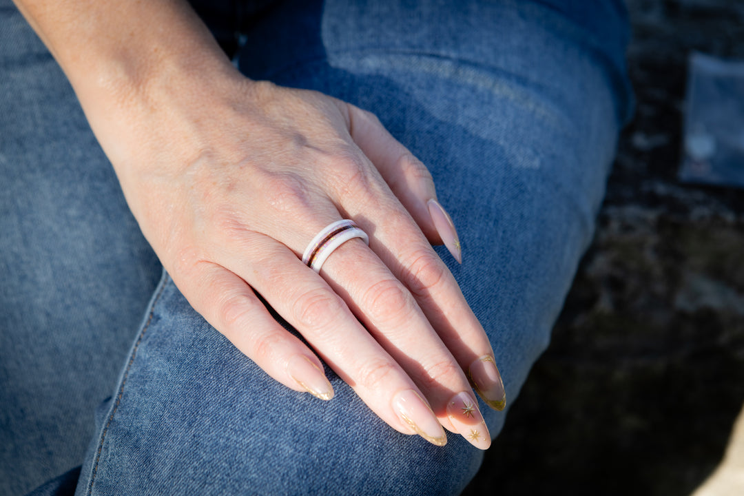 hair in ring being worn by woman