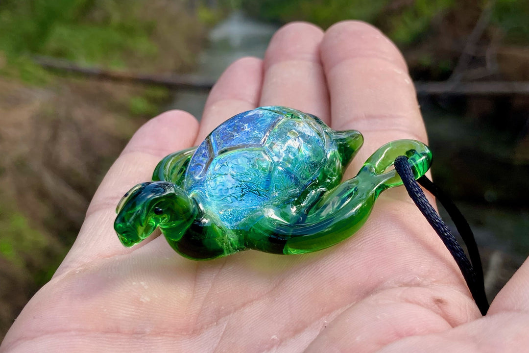 Green blue dichroic sea turtle pendant infused with cremation ashes