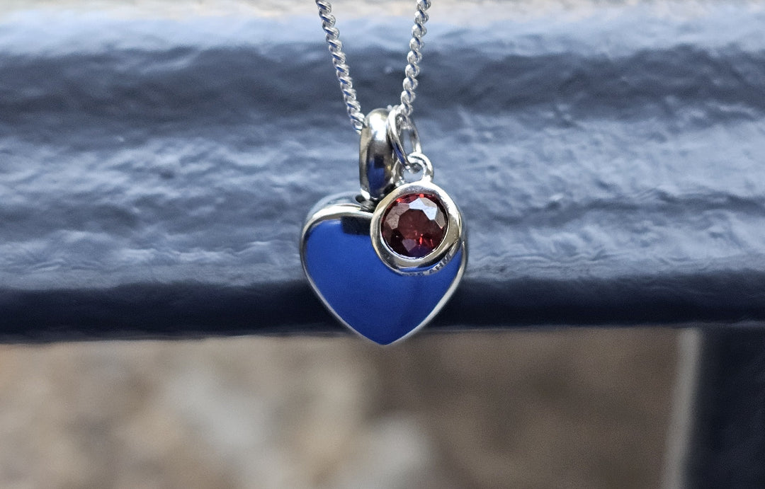 birthstone charm with ash