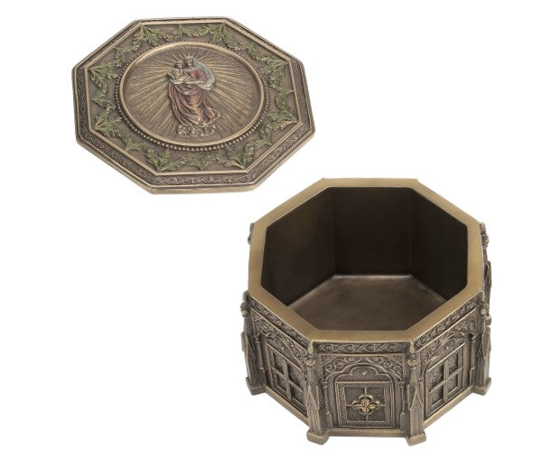 Open octagonal Madonna keepsake urn shows hollow interior with lid beside it and Madonna medallion.