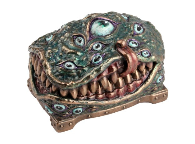 Teal bronze mimic urn with a toothy grin and many eyes along its textured surface.