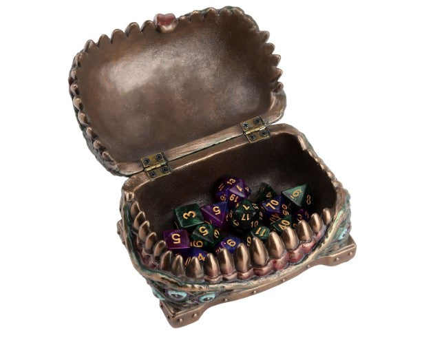 Open mimic chest urn filled with purple and green dice.