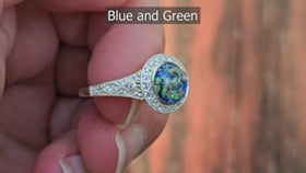 filigree cremation ring super cut video being held by fingers
