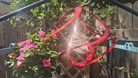 red spinner with cremation ash