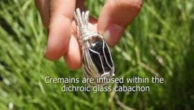 Wire wrapped glass pendant with cremation ash