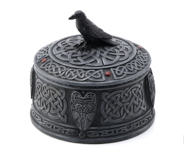Celtic Raven keepsake urn with a raven figure on the lid and intricate knotwork around the body