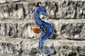 glass seahorse with cremation ash