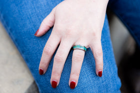 woman wearing titanium carbide ring with cremation ash