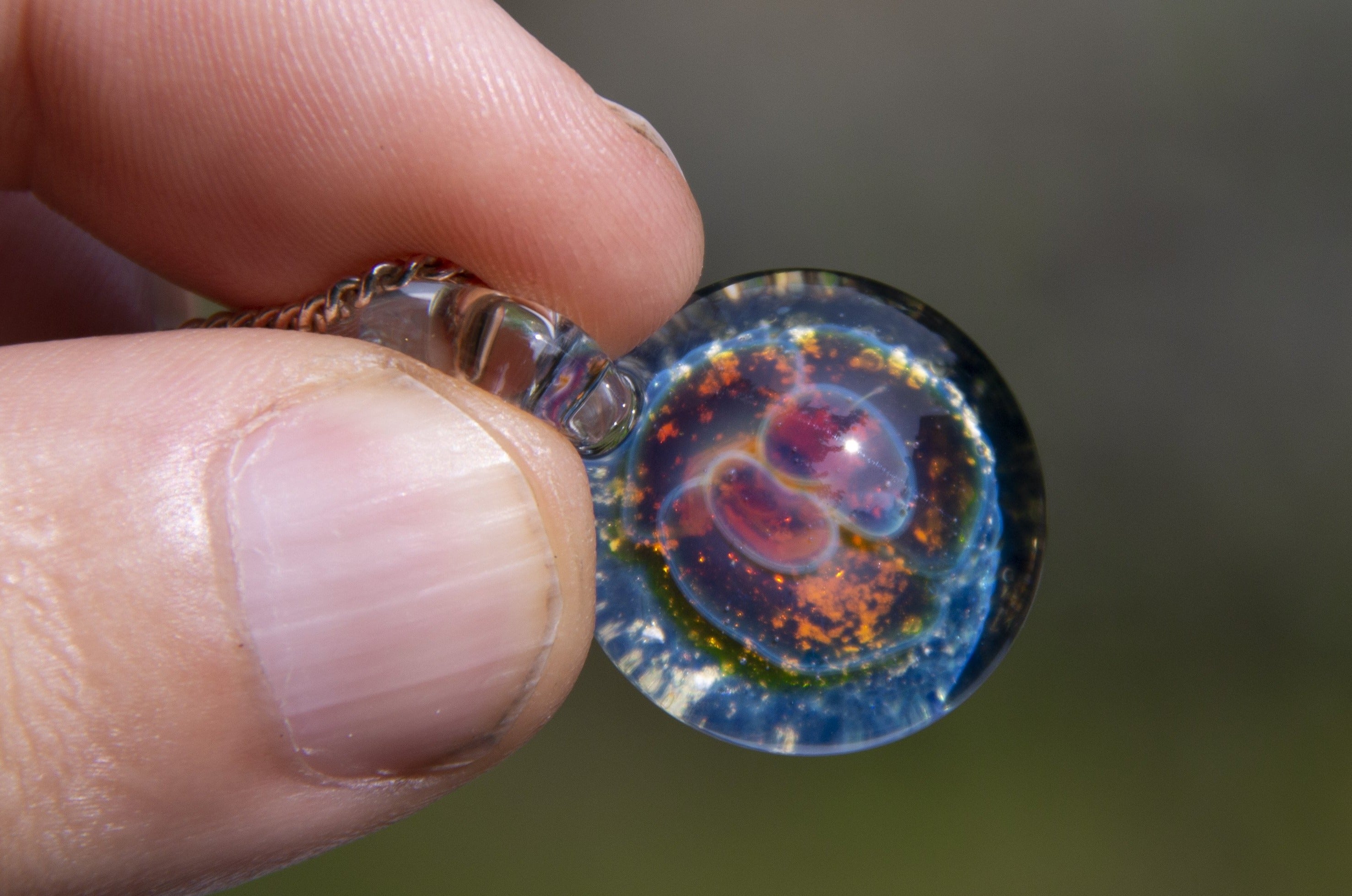 Trippy glass on sale pendant necklace