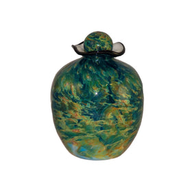 green glass urn for cremation ashes of person
