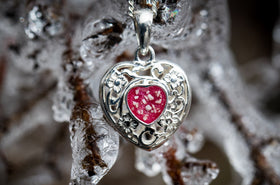 Filigree heart pendant with ash