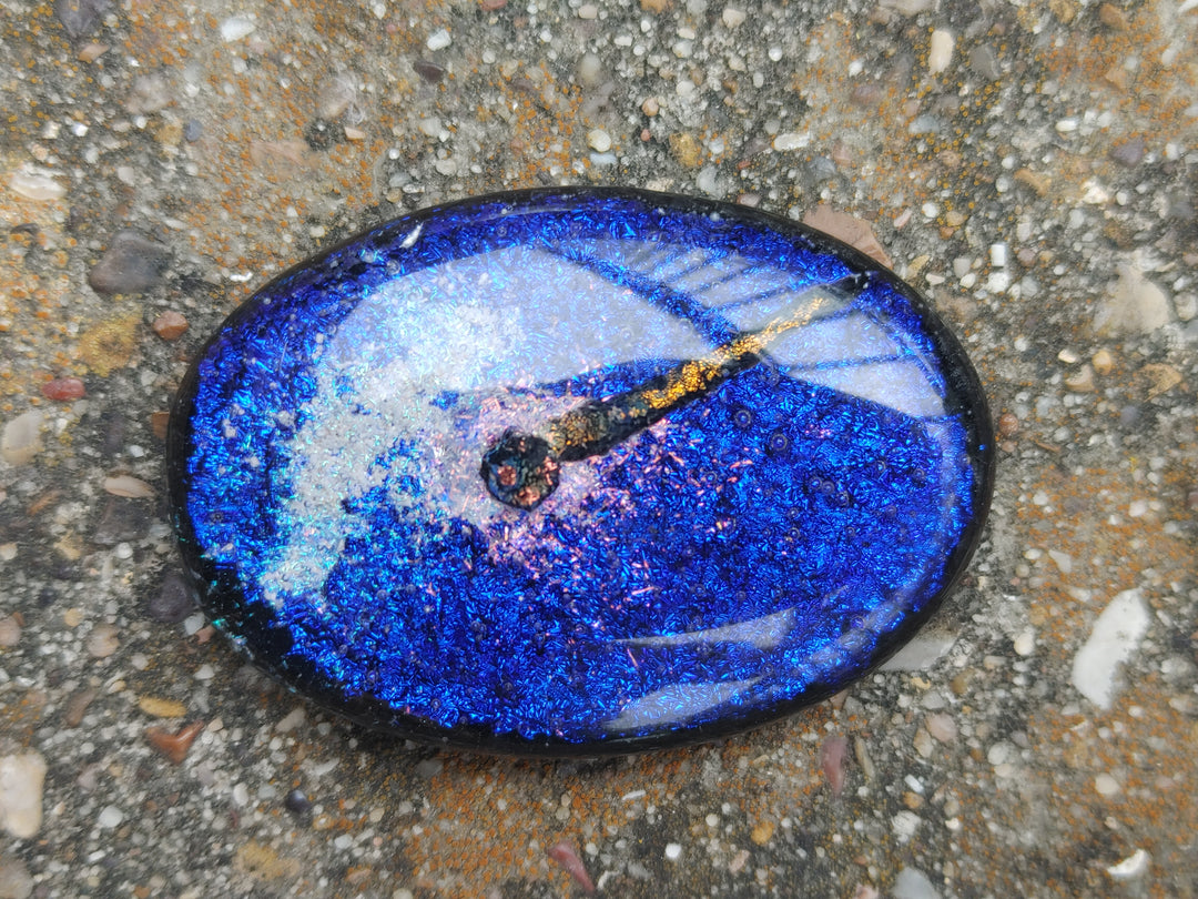 glass touchstone with ash