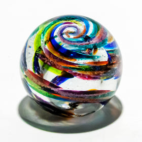 paperweight with  cremation ash rainbow coloring