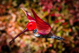 red dichroic hummingbird memorial art