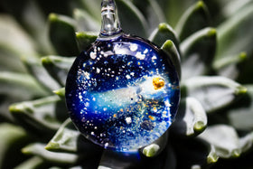 glass comet pendant with ash