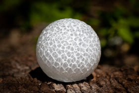 golf ball with cremation ash