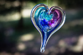 glass heart with cremation ash