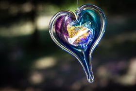 glass heart with cremation ash