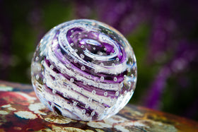 Glass paperweight with cremation ash from people and pets