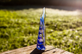 memorial glass flame with cremation ashes