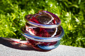 red metal planet ashes in glass memorial for people and pets