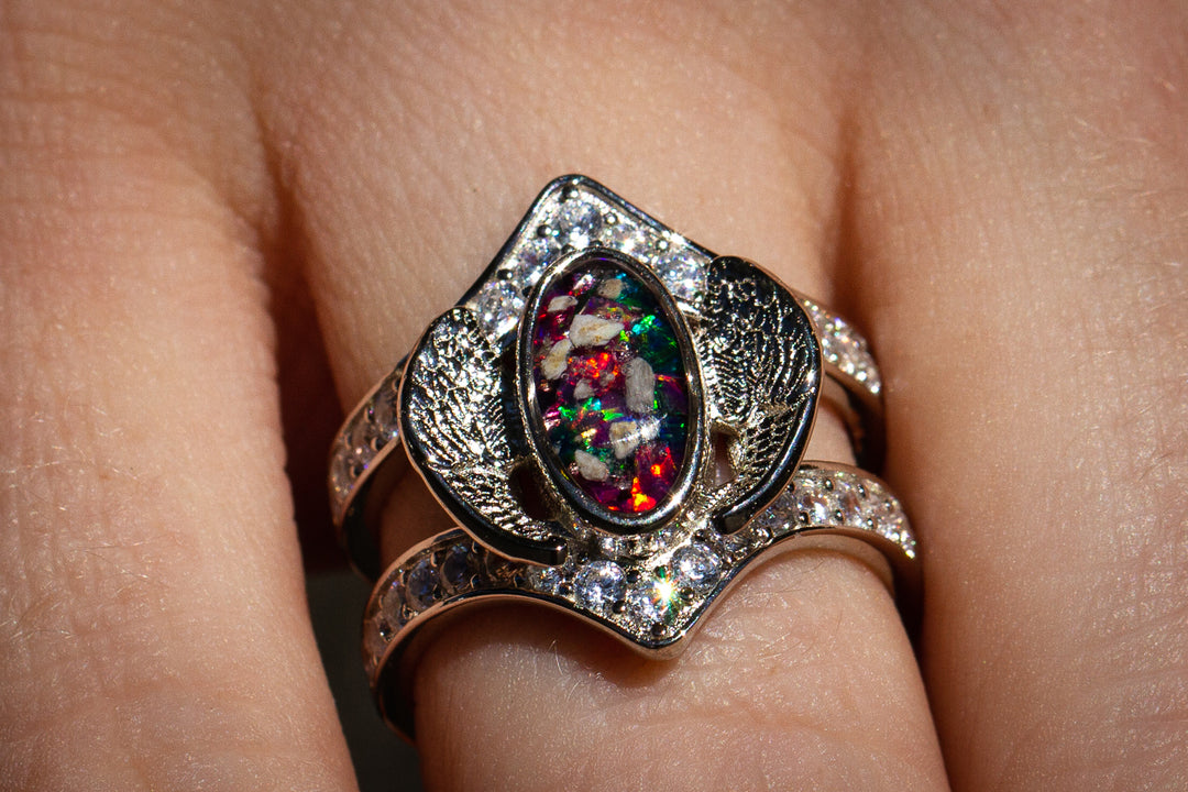 Sterling Silver Embraced Opal Angel Wings Ring, with turquoise and magenta crushed opal, worn by model. Sterling Silver Jewelry for Ash, Sterling Silver Ring, Sterling Silver Angel Wing, Angel Jewelry, Angel Jewlery for Ash, Ring for Remembrance, Memorial Jewelry