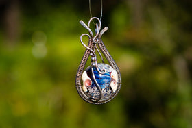 Wire wrapped alien world cremation jewelry