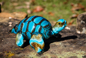 glass turtle with cremation ashes