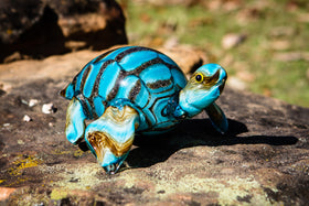 glass turtle with cremation ashes