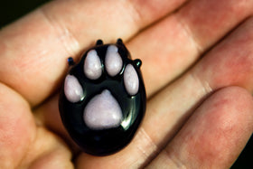 Pawprint touchstone with cremation ash